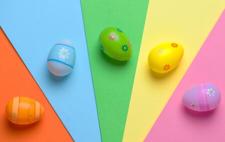 Colorful Easter eggs on colorful background