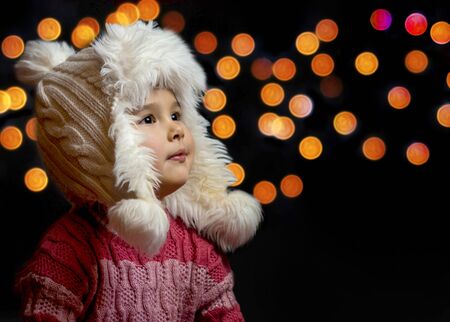 Little girl indoor on christmas day.