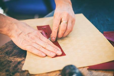 Woman working on a handmade bag