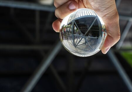 Metal arhitecture through the lensballの写真素材