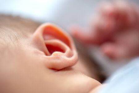 Closeup of a newborn earの写真素材