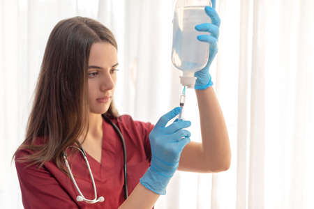 young doctor preparing the injection