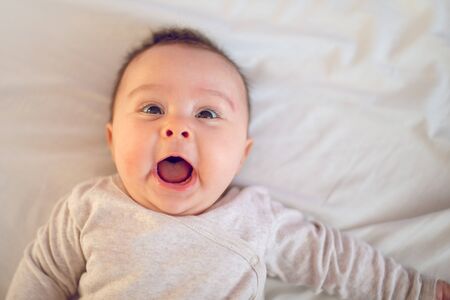 Portrait of a happy  little newborn girlの写真素材