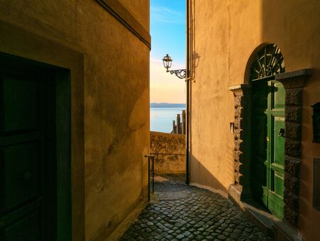 Old town street on evening in Italyの写真素材