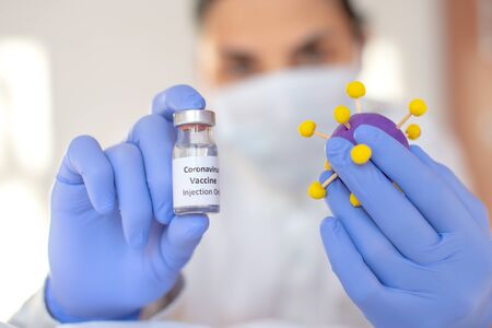 Young female scientist working in the CDC laboratory and founded vaccine for coronavirus.