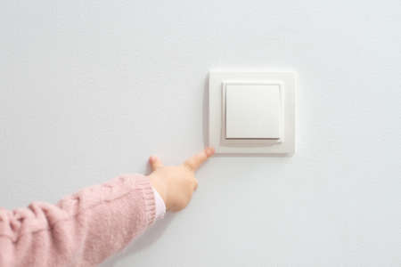 Portrait of cute infant baby girl wearing a traditional Romanian costumeの写真素材