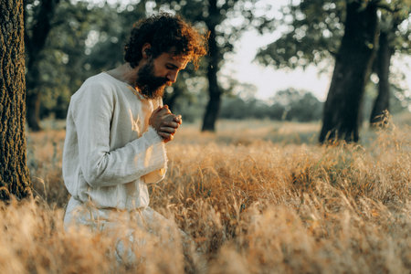 Jesus Christ Alone in the Garden, Meditating and Prayingの写真素材