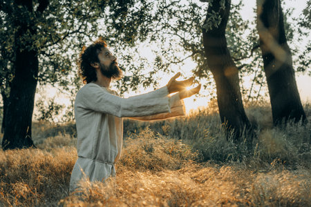 Jesus Christ Alone in the Garden, Meditating and Prayingの写真素材