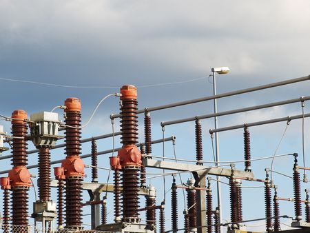High voltage electric power transformer substation. Industrial ceramic insulators.
