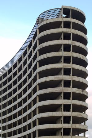 Monolithic concrete frame of new building with unfinished upper floors.の写真素材