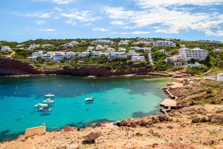Cala Morell cove scenery in sunny day at Menorca, Spain の写真素材