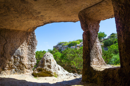 View from the inside of Cala Morell Necropolis Caves at Menorca, Spain の写真素材