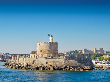 Rhodes sea fortress with old town in the background, Greece.のeditorial素材