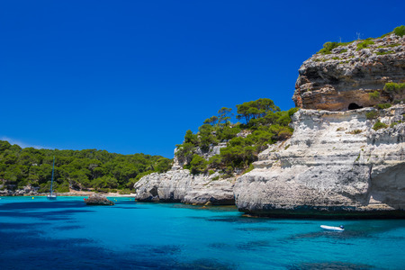 Cala Macarelleta beach cliffs at Menorca island, Spain.の写真素材