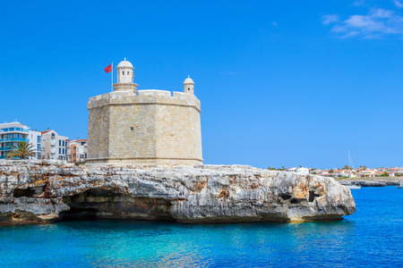 Castle of St. Nicholas or Castell de Sant Nicolau at the Ciutadella town port on a sunny summer day, Menorca island, Balearic islands, Spain.のeditorial素材