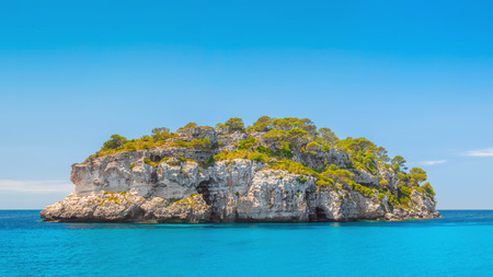 Deserted island in turquoise water of the sea.の写真素材