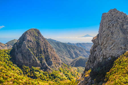 La Gomera mountain landscape with Teide volcano peak in the background, Canary Islands, Spain.の写真素材