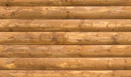 Seamless wooden round timber country house wall texture.の写真素材