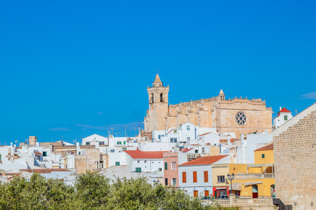 Ciutadella town cityscape with Basilica of Ciutadella de Menorca cathedral among historical center buildings, Menorca island, Spain.の写真素材
