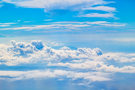 Fluffy cloudscape background. Sky view with cumulus clouds.の写真素材