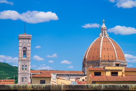 Florence background with old town roofs and Cattedrale di Santa Maria del Fiore dome. Italy.の写真素材