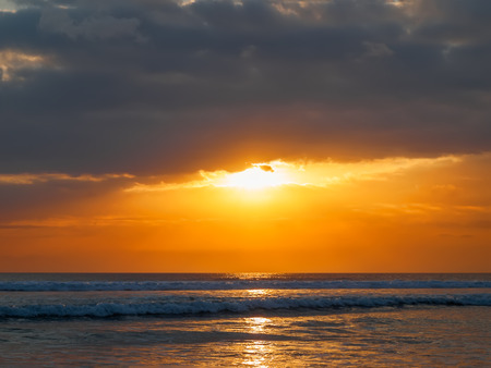 Bali Orange Sunset. Beautiful Ocean Asian Sunset. Travel Background. Indonesia.の写真素材