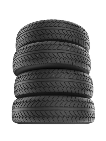 Stack of New Studded Winter Tires Isolated on White Background. Snow Spiked Tyres Render. 3D Illustration.の写真素材