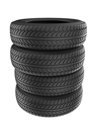 Stack of New Studded Winter Tires Isolated on White Background. Snow Spiked Tyres Render. 3D Illustration.の写真素材