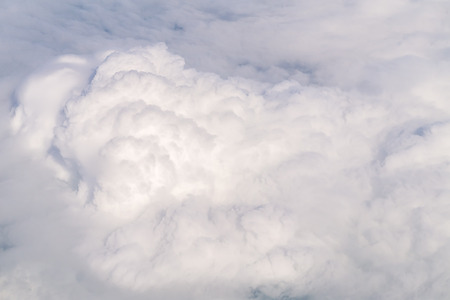 White Heap Clouds Viewed from Above. Big Sky Clouds Background.