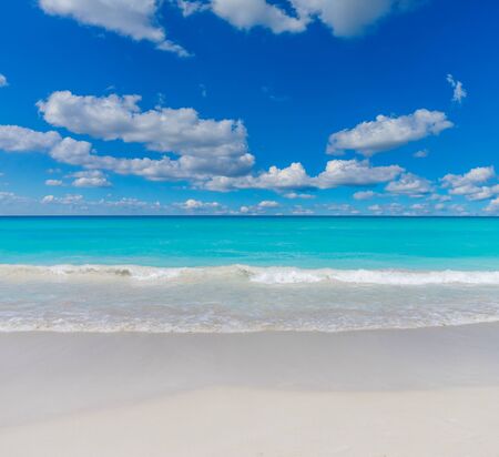 Tropical Sea Beach with Waters Edge Waves. White Sand Beach Waterfront Summer Background.の写真素材