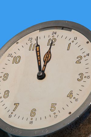 Close up of white faced old ship clockの写真素材