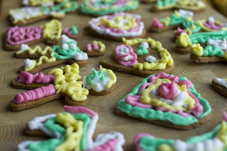 Closeup of homemade christmas gingerbreads with colorful sugarcoatingの写真素材