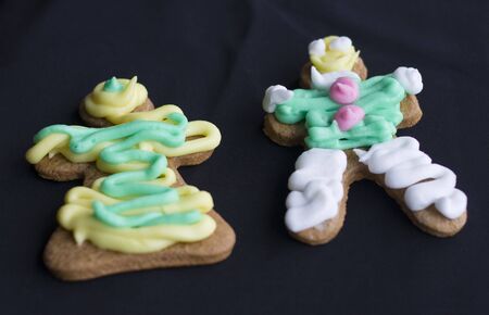 Closeup of homemade christmas gingerbreads with colorful sugarcoatingの写真素材
