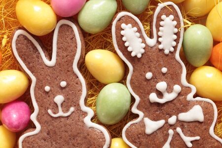 Close-up of Easter gingerbread cookies and candy eggsの写真素材