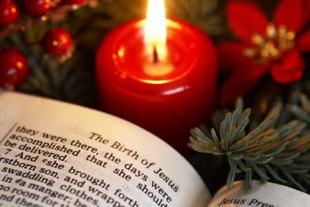 Open Bible and Christmas decorations.