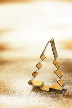 Cookie cutter on flour or sugar backgroundの写真素材