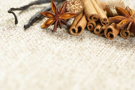 Cinnamon sticks, anise stars, nutmegs and vanilla beans