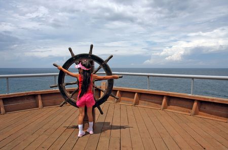 little girl managing vesselの写真素材