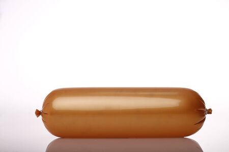 Delicious sausage with reflection on light backgroundの写真素材