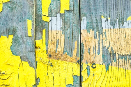 Old grunge wood panels texture with old colorful paintの写真素材