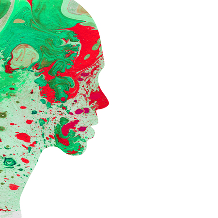 Abstract raster watercolor hand drawn posrtrait illustration of girl in profile filled with mix of green and red oil paints with stains on white background copyspaceの写真素材