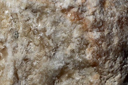 Photo closeup of beautiful costal beach cracked solid sharp bright beige sea bay solar salt crystals...