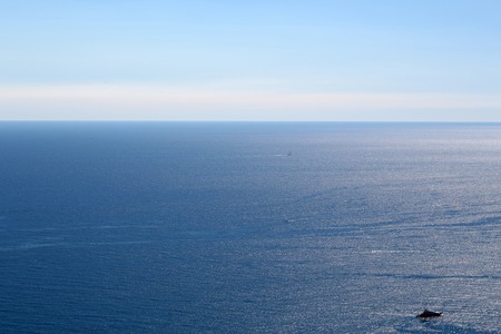 Photo seen from above of peaceful offing and vessels offshore zone seacoast coastal waters of beautiful blue sea horizon on wonderful weather day time on clear sky background, horizontal pictureの写真素材