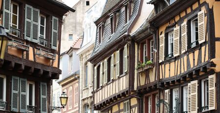 COLMAR, FRANCE - September 18, 2015: French alcase colored half-timbered facades in Colmar, horizontal photoのeditorial素材