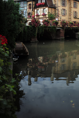 COLMAR, FRANCE - September 18, 2015: Water canal in Little Venice neighborhood of Colmar, vertical photoのeditorial素材