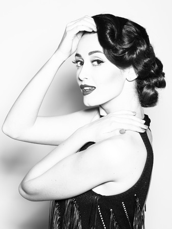 Portrait of attractive sensual glamour retro elegant young adult pensive woman with classic...