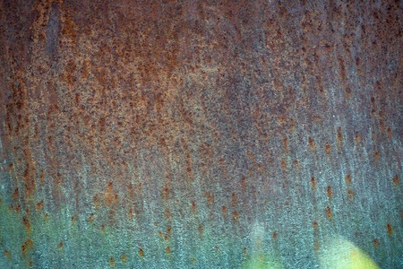 Rusty iron surface old grunge brown blue sheet of iron fragment