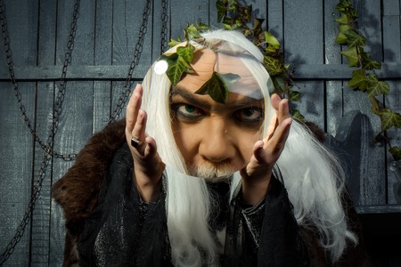 Zeus god or jupiter with magnifier. Mythology, ancient Greece, emotionsの写真素材