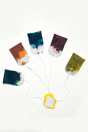 Colorful teabags drawing isolated on white background with watercolor paintの写真素材