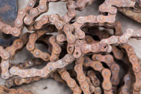 Old dirty rusty bicycle chain background
